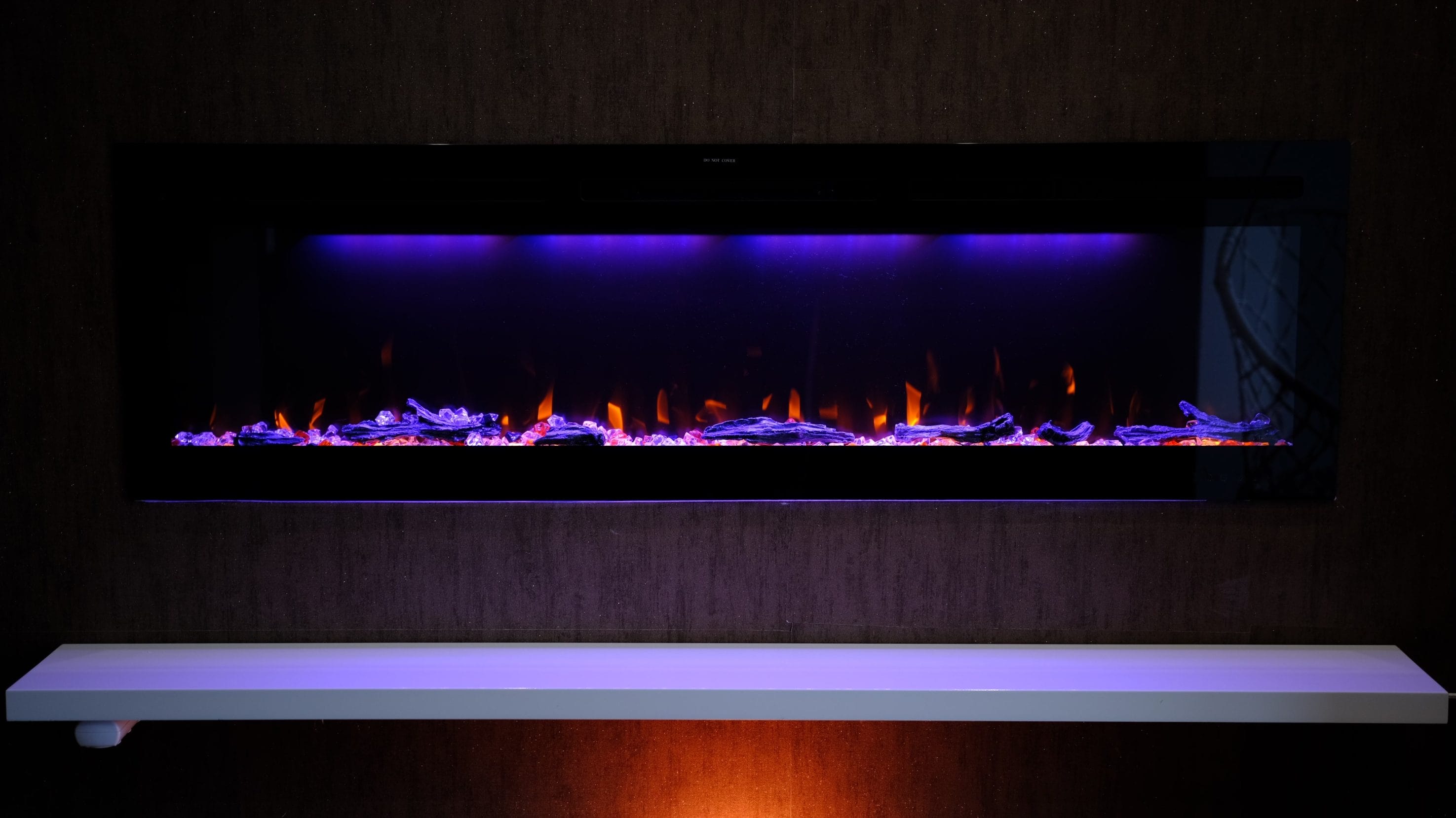 A stock image of electric fireplace with blue flames.