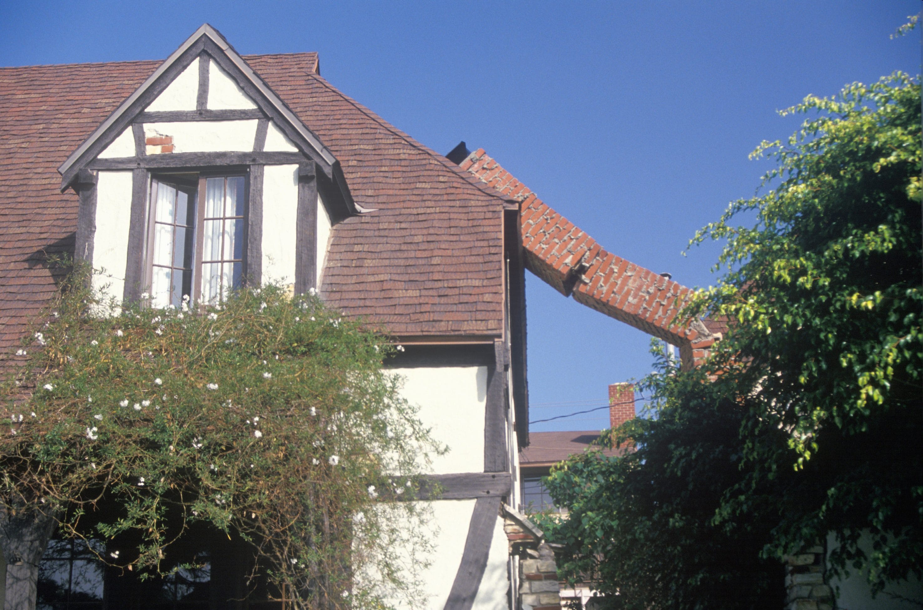 A stock image of collapsed masonry chimney.