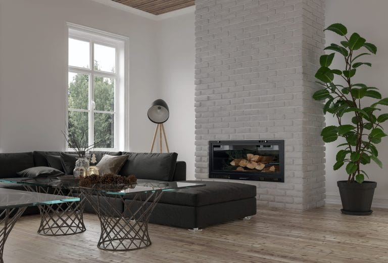 Stock image of wood fireplace insert in a nice living room.